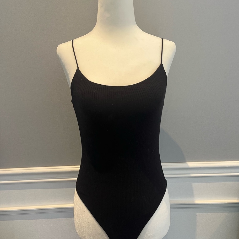 Garage body suit black size xs snap closure on bottom thong style skinny straps